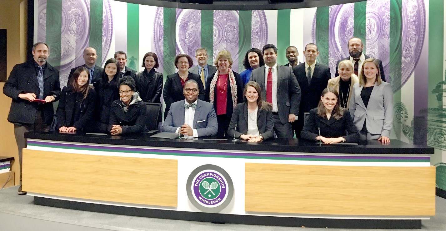 Kayla and the Winter MBA 2016 group of students inside the press room at Wimbledon