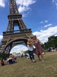 having a picnic in front of the Eiffel tower