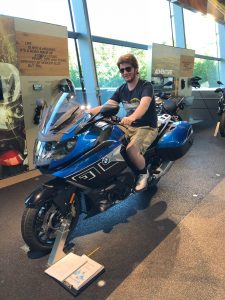 Riding a motorcycle at BMW Welt