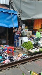 Thai woman at train market