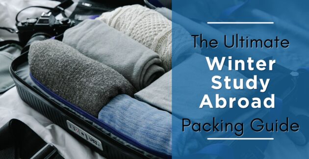 Image of a suitcase packed with knit sweaters, jackets, and pants for winter travel overlaid by text reading, "The Ultimate Winter Study Abroad Packing Guide."